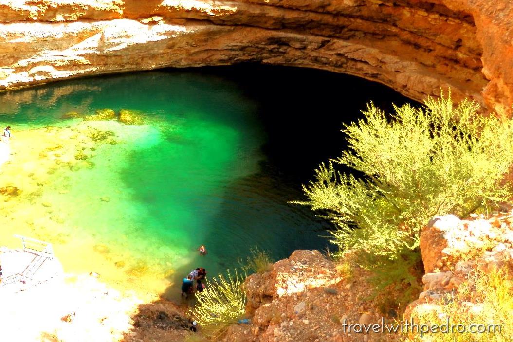 Taking a Dip in Bimah Sinkhole, Oman